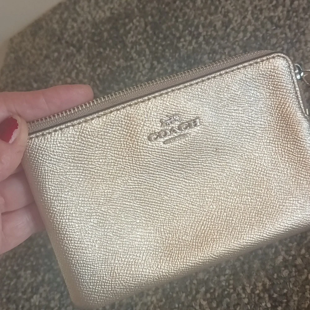 Coach vintage gold metallic shiny pebble grain leather wristlet